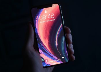 Realistic Holding iPhone X Mockup