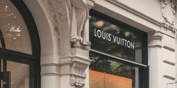 LVMH Moet Hennessy Louis Vuitton Rating Increased to Hold